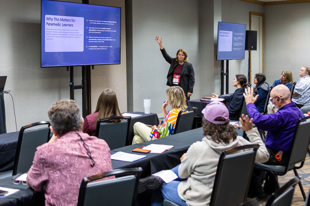Speaker in breakout session interacting with session attendees | Texas EMS Educators Summit