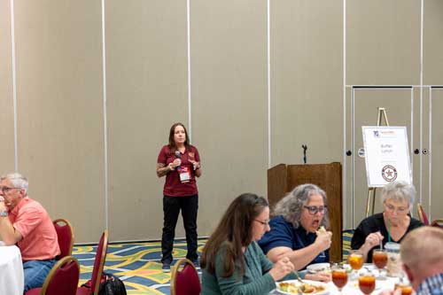 Attendees eating lunch while lunch sponsor presents | Texas EMS Educators Summit